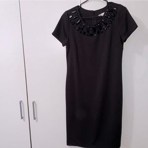 Black dress with diamond neckline